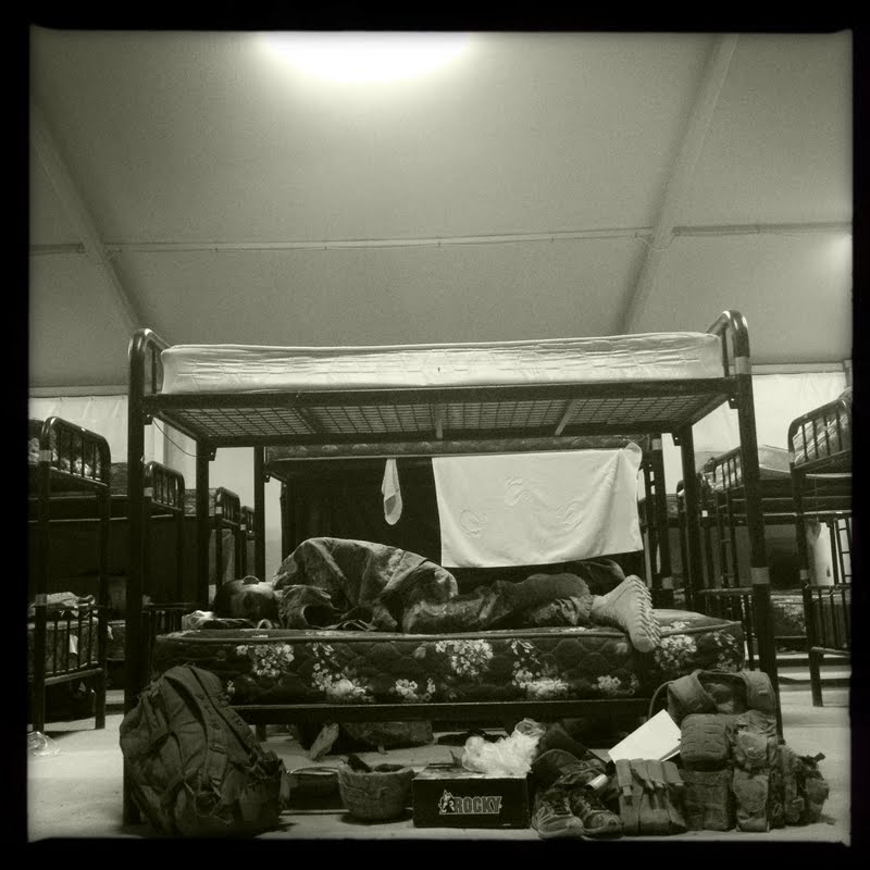 Anyone who has deployed will recognize this scene:  sleeping in transient barracks enroute to or from Iraq or Afghanistan.